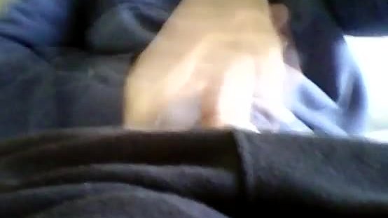 Teen jerks off his cock and balls