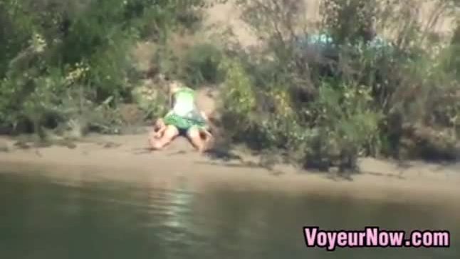 Horny couple by the river