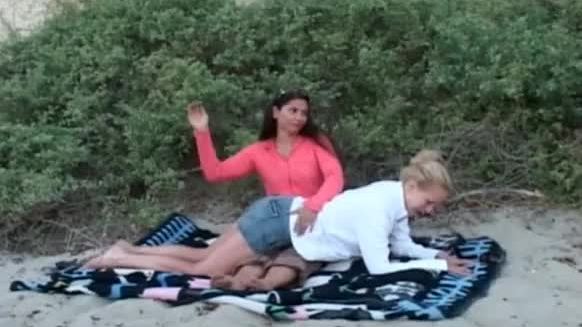 Beach blanket slapping video video